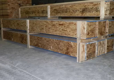 custom oriented strand board crates in warehouse