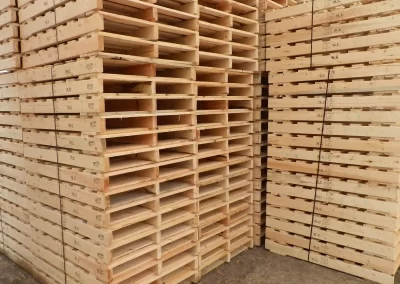 close up of stacked wood pallets